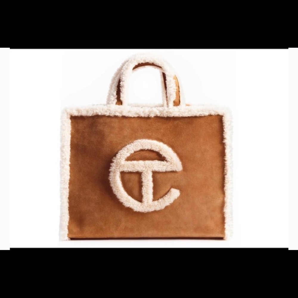 Ugg Medium Telfar from Telfar site. Brand new with duster